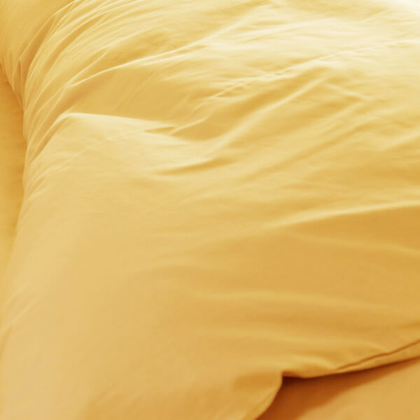 寝具を温かみのある雰囲気に演出してくれる黄色